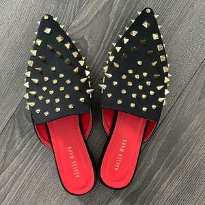 Akira spiked slip ons